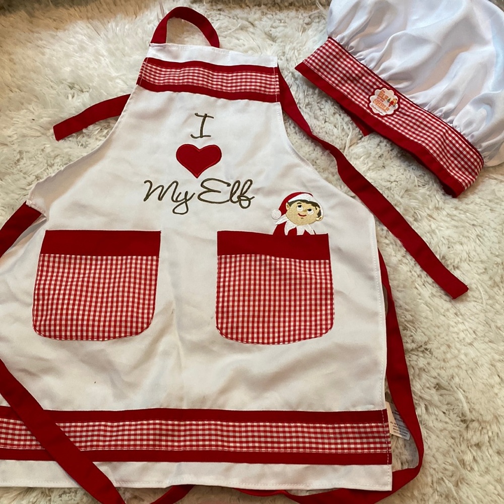The Elf on the shell apron and Chef hat